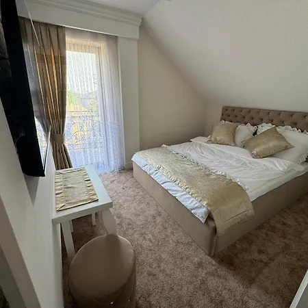 Hotel apartamentowy Domilo Mzyki *